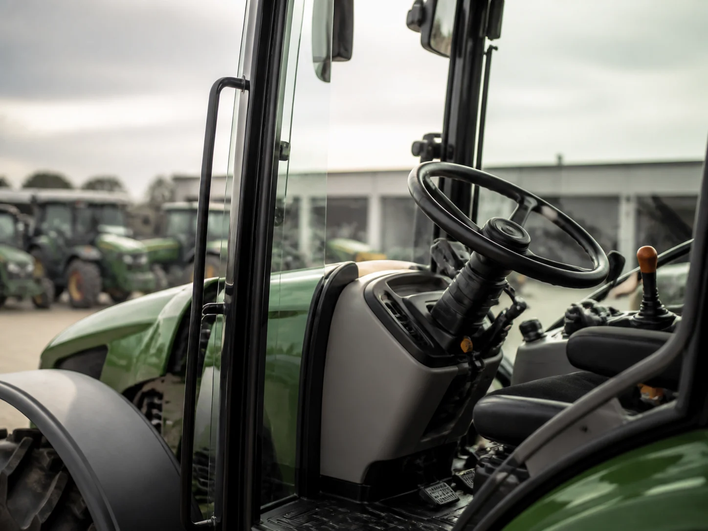 Tractor cab and controls in an equipment yard